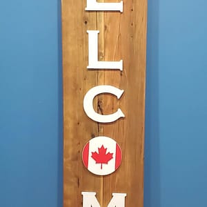 Vertical welcome sign with Canadian flag