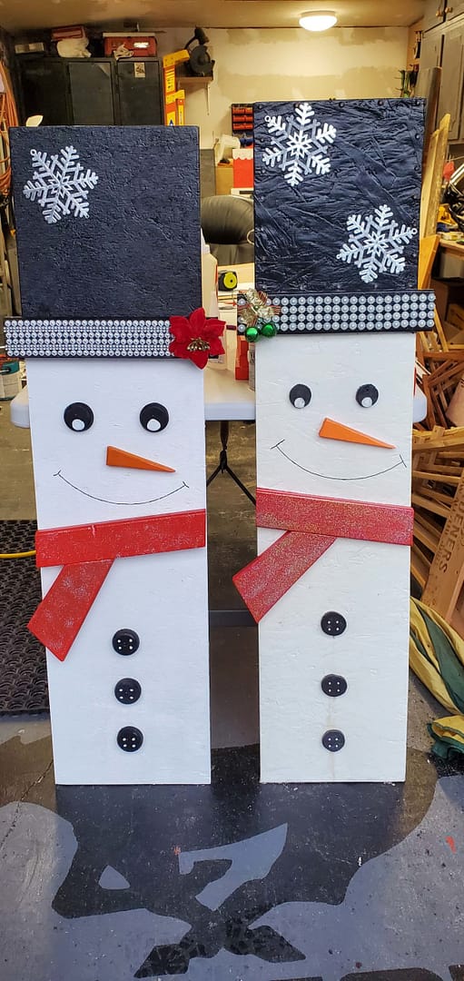 wooden outdoor Christmas themed snowmen