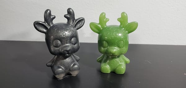 cute green and grey baby reindeer epoxy figure