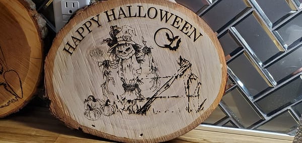 Halloween theme laser engraved on wood round