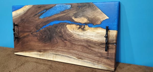 side profile of blue epoxy river board