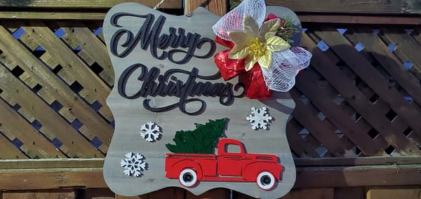 Merry Christmas theme grey wall decor with a red truck