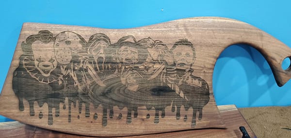 oiled cutting board with villain portraits