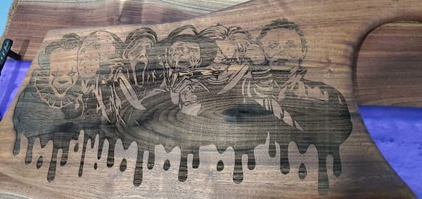 villain portraits laser engraved on walnut board