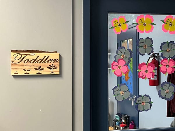 Toddler classroom sign laser engraved on black walnut wood