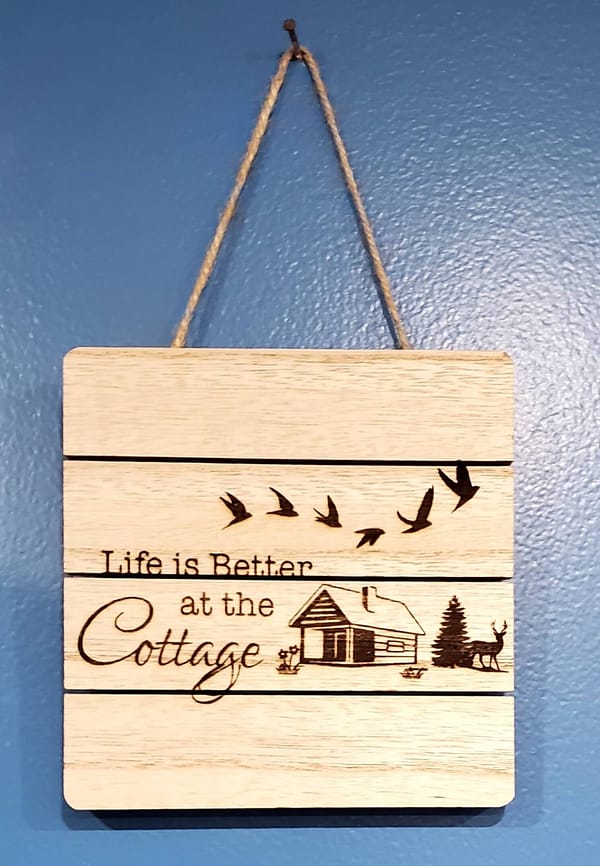 cottage theme laser engraved on lined wood sign